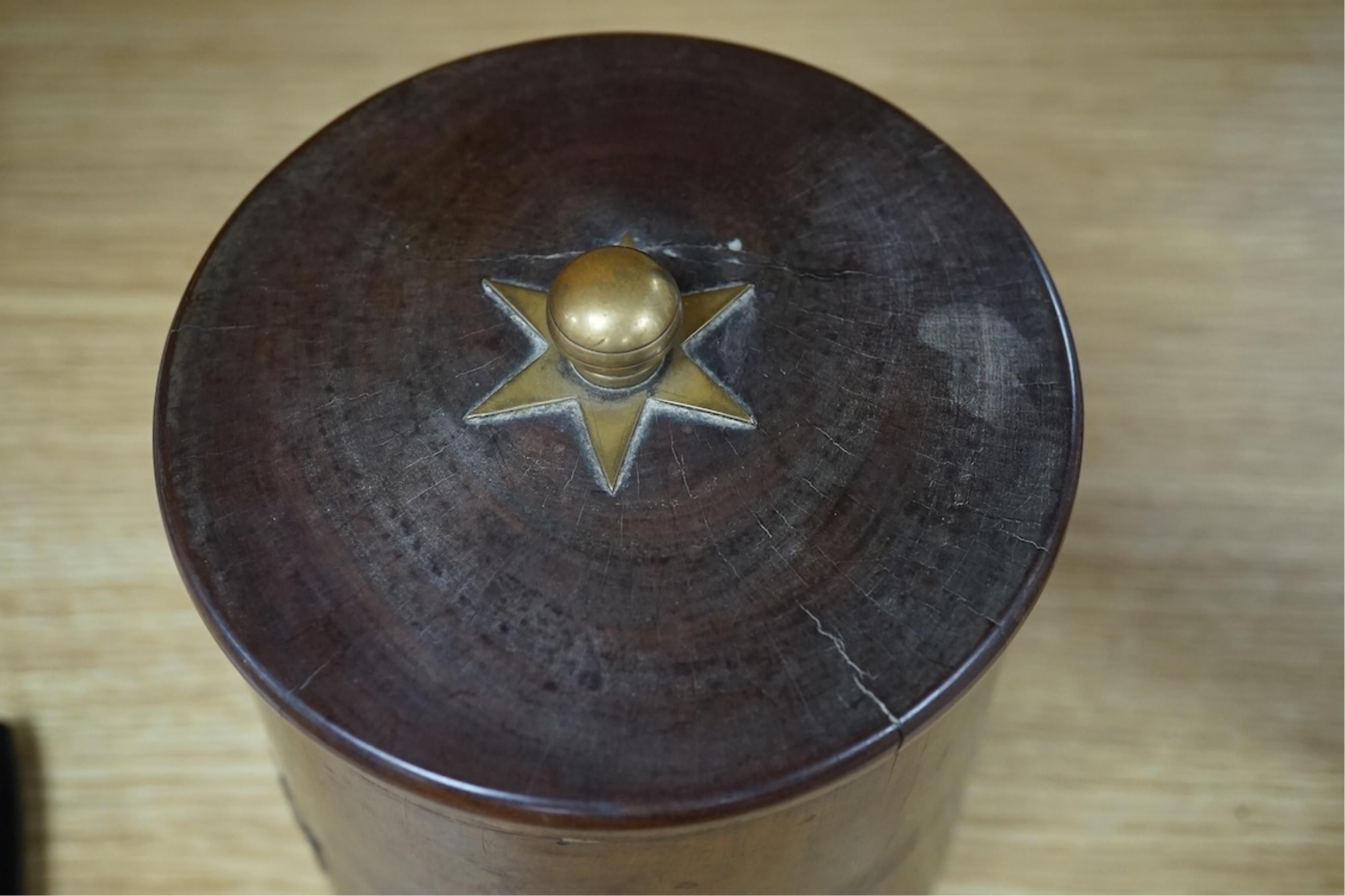 A 19th century turned lignum vitae biscuit barrel with applied brass letters; ‘The King God Bless Him’, 15cm